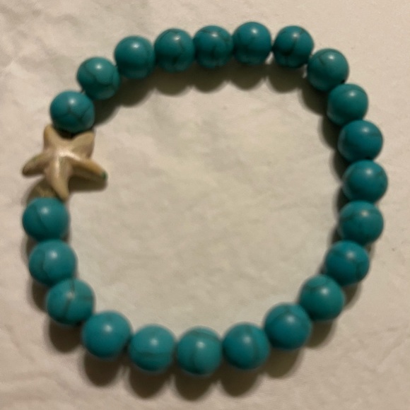 Two Turquoise colored bead bracelets stretch casual and fun one with a starfish - Picture 4 of 4